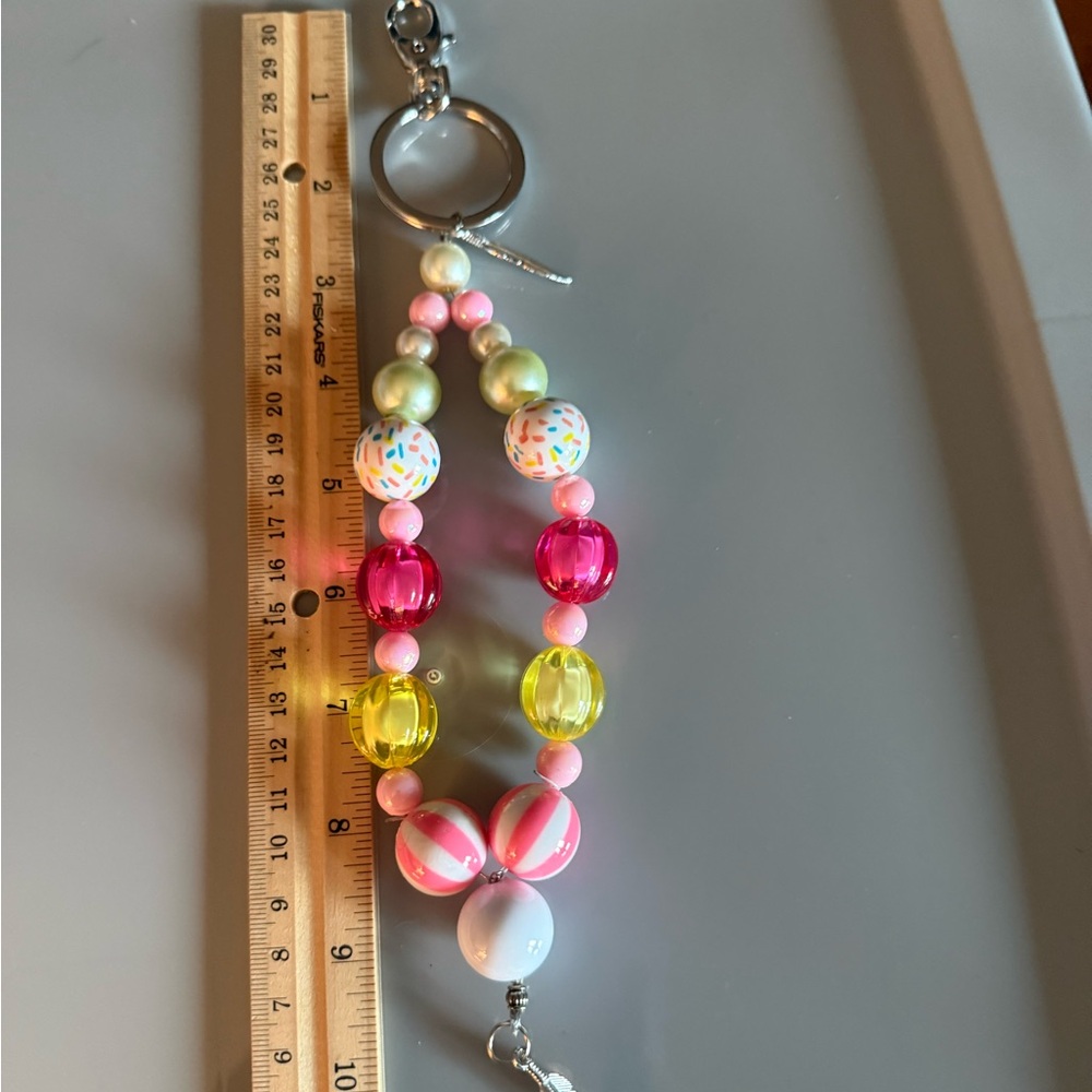 Wristlet handmade bubblegum 20mm keychain 
See pics